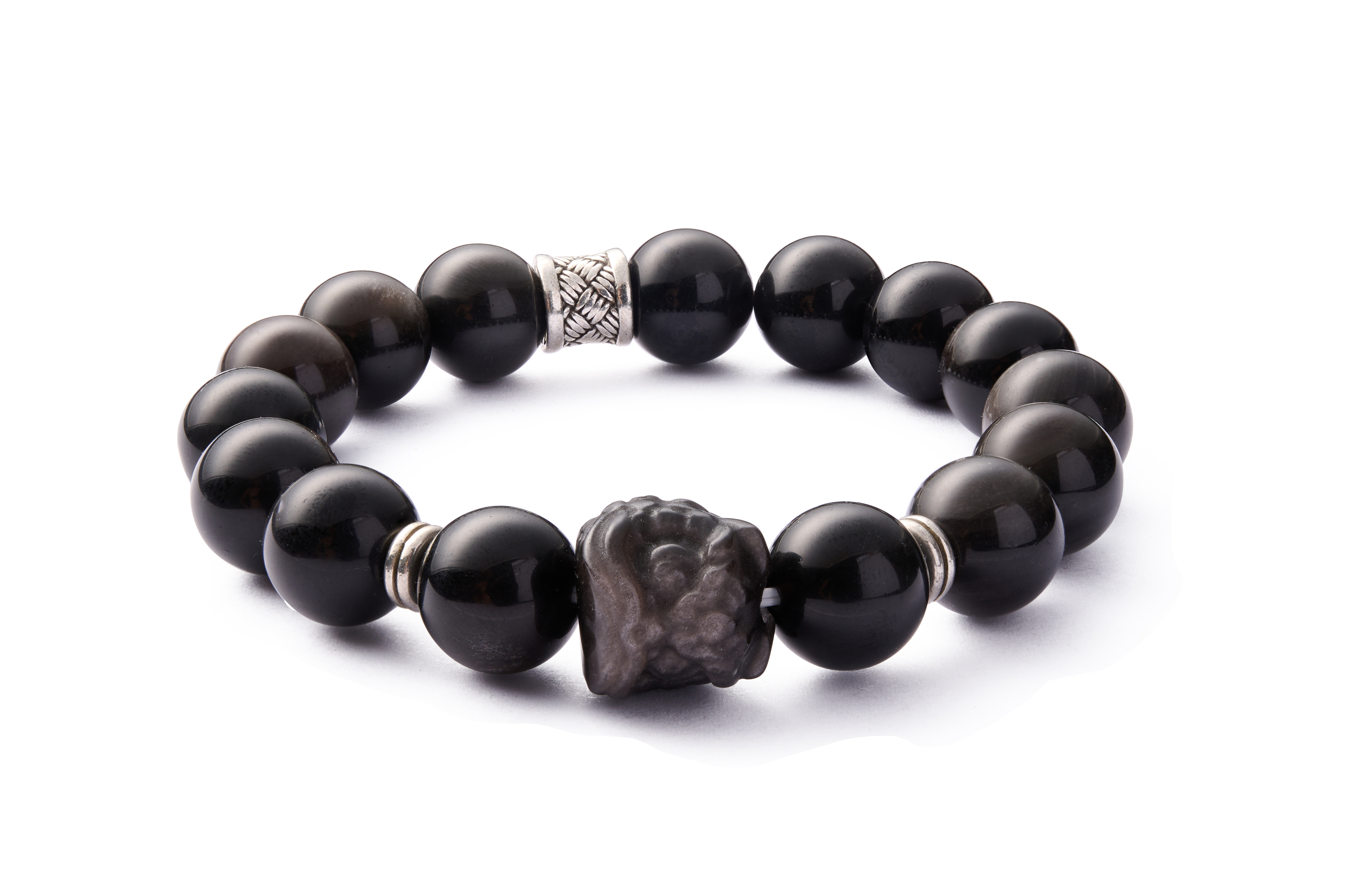 Flat composition showing size contrast of focal bead and standard rounds, balanced couple set