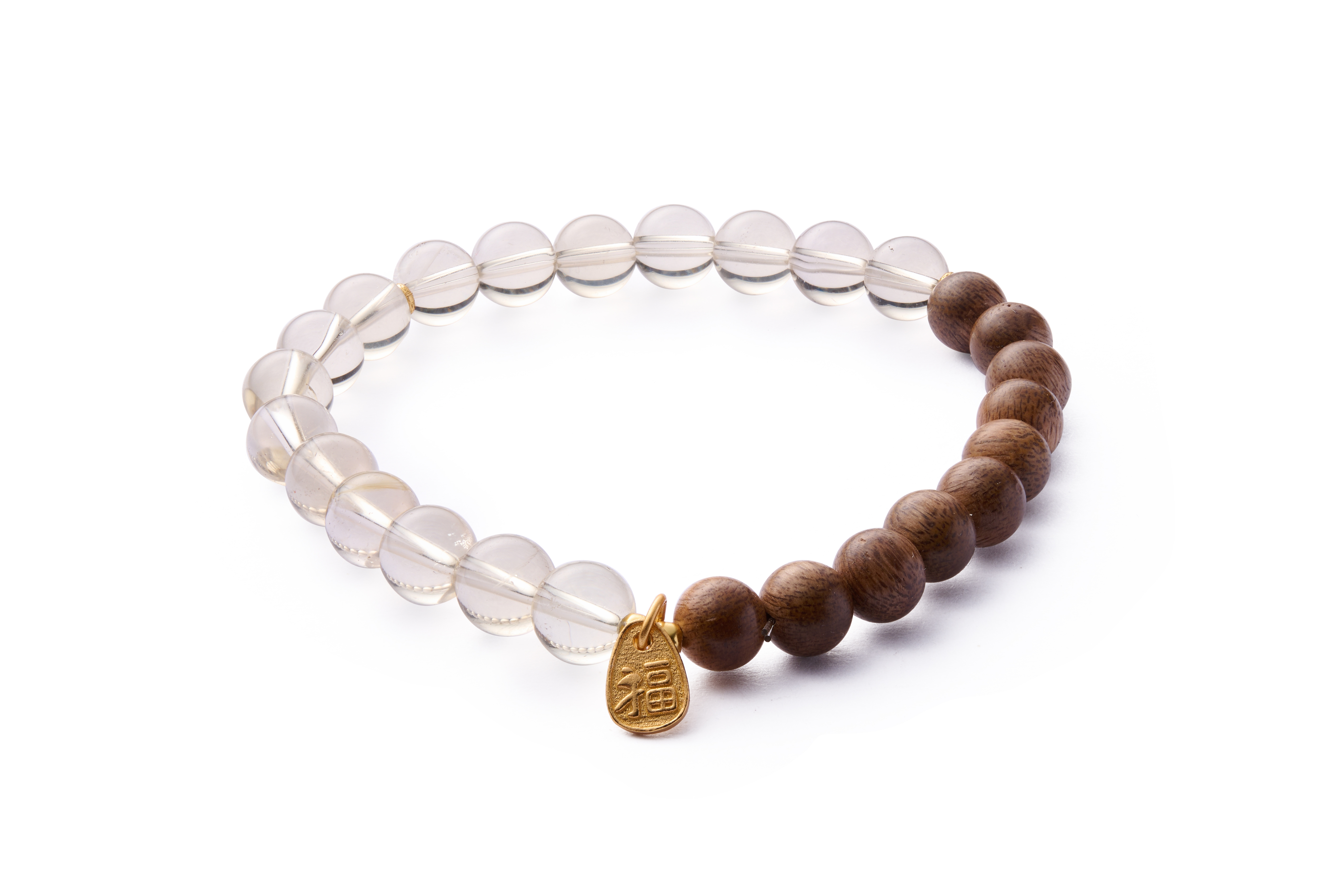 Diagonal flat lay highlighting bead spacing with hidden elastic cord, minimalist unisex style