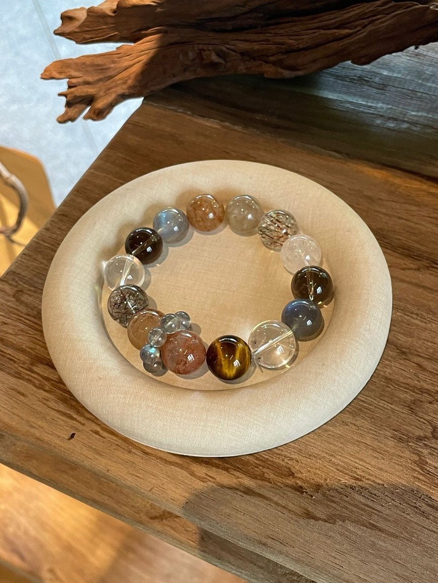 Hand showing detailed gemstone texture and natural inclusions