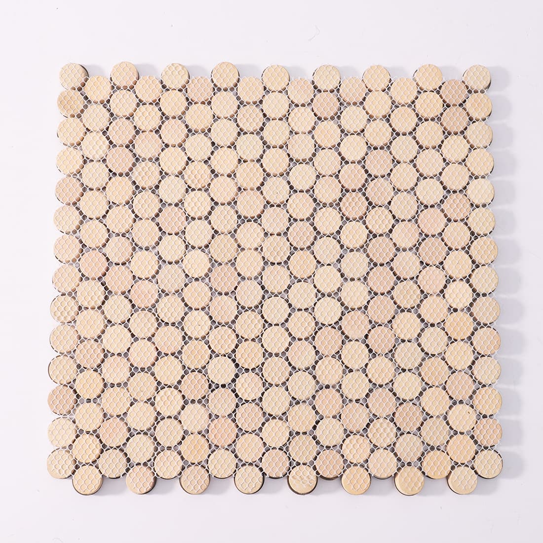 Back view of mixed gold and silver mosaic tile showing the fiber mesh