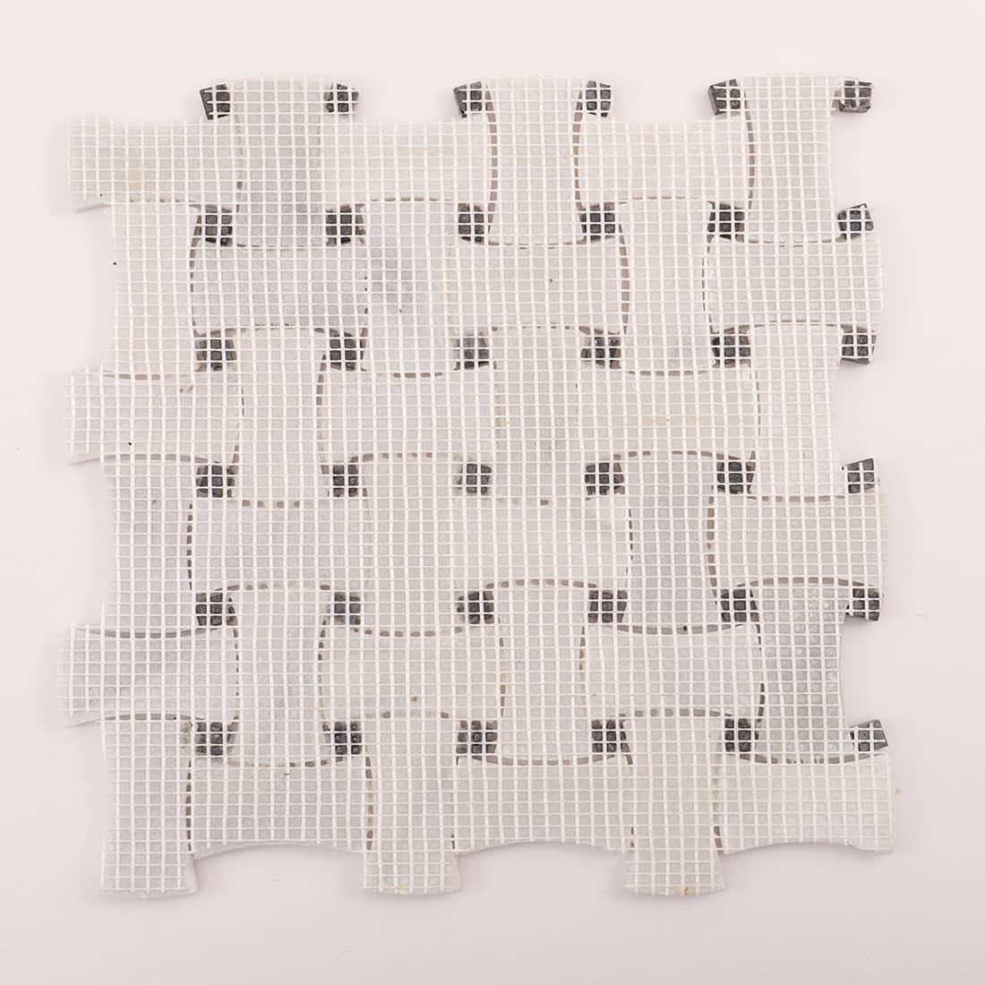 Back view showing mesh backing and layout of the basketweave mosaic sheet.
