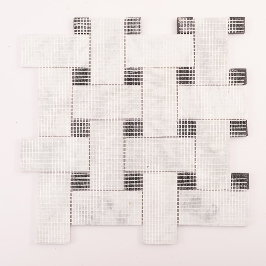 Back view of the mosaic sheet showing mesh backing and tile layout.