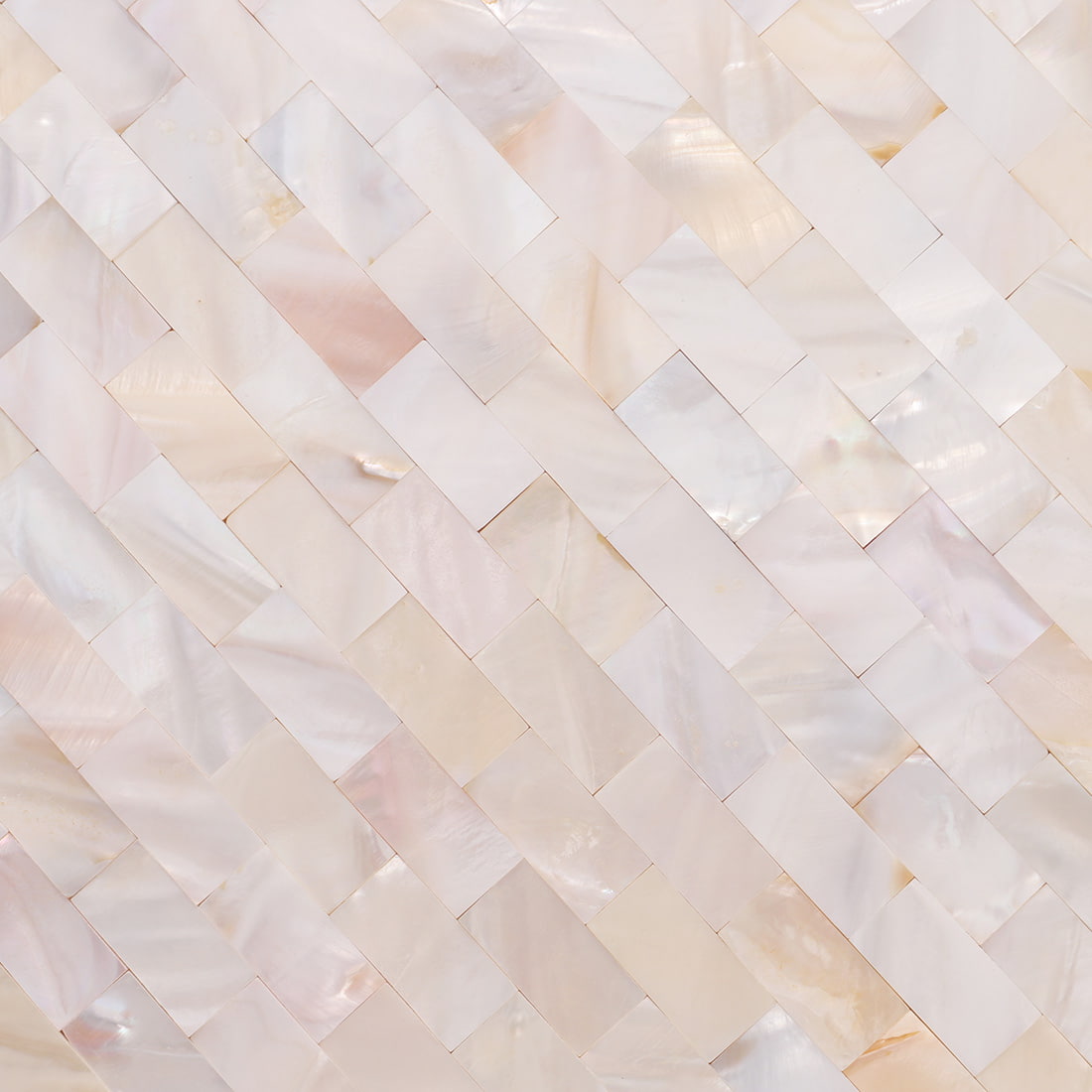 Closeup of beige mother of pearl brick mosaic pattern and natural shimmer