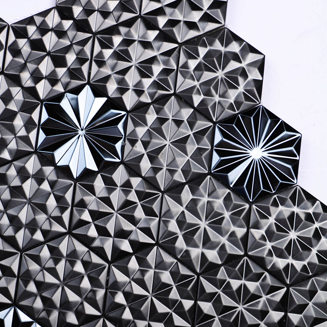 Black geometric metal mosaic tile pattern with brushed and glossy accents