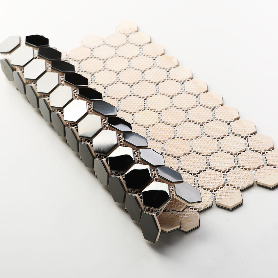 Front and back view of black hexagon tiles showing the white fiber mesh mounting