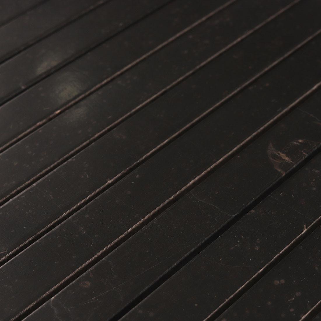 Close-up of natural black marble bar mosaic surface texture