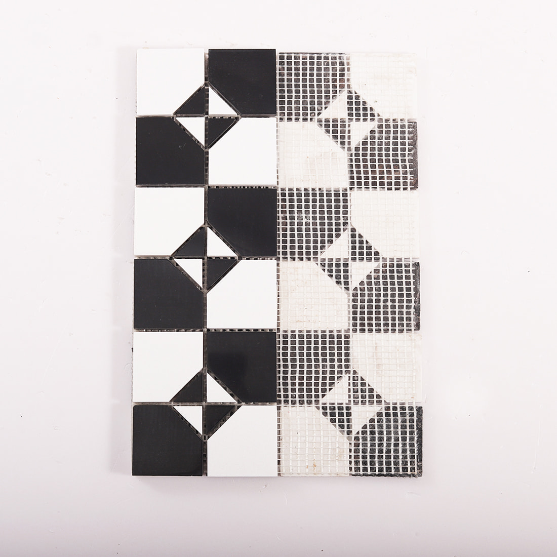 Mesh backing view of black and white square marble mosaic tile sheet