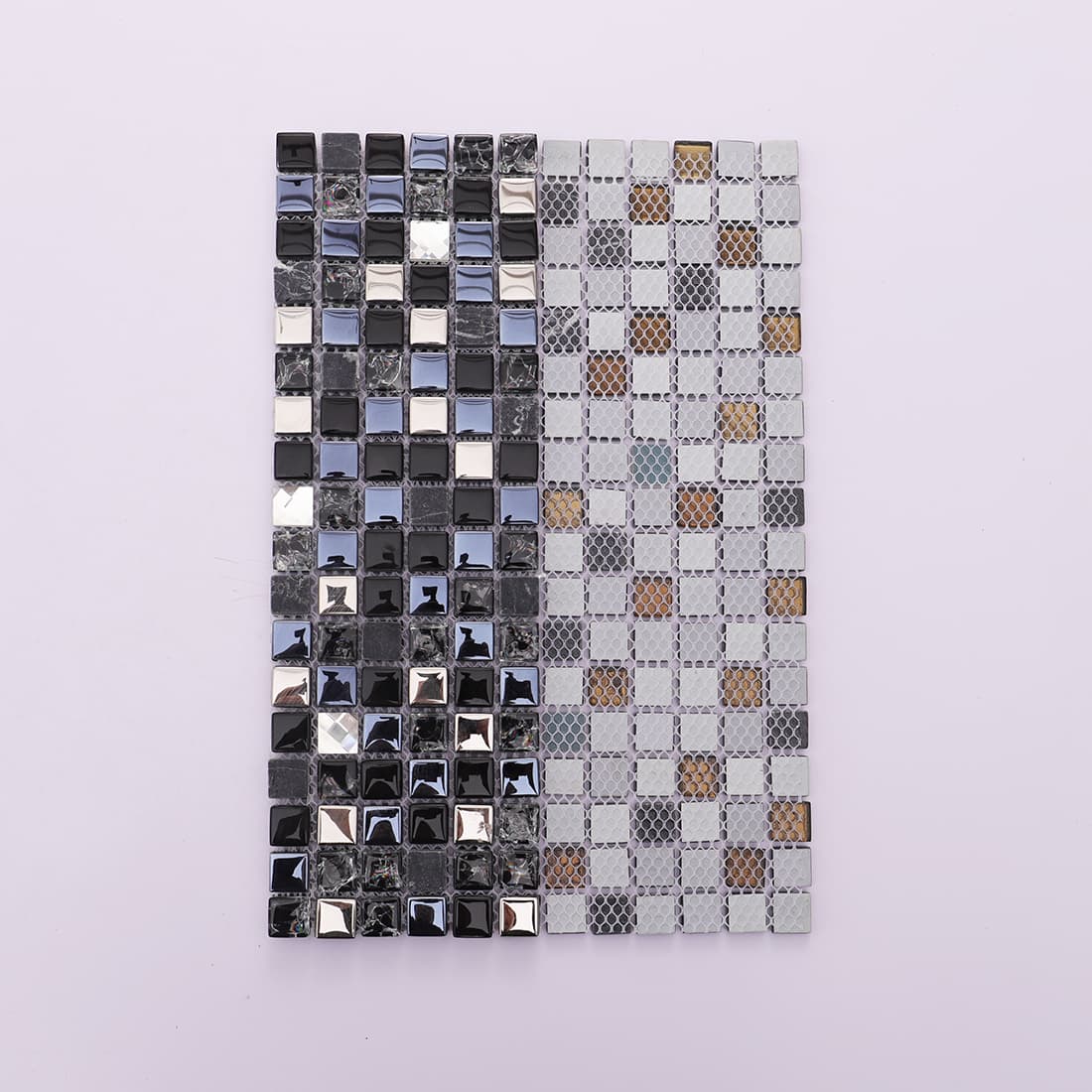 Black silver and crystal square glass mosaic sheet folded to show mesh backing