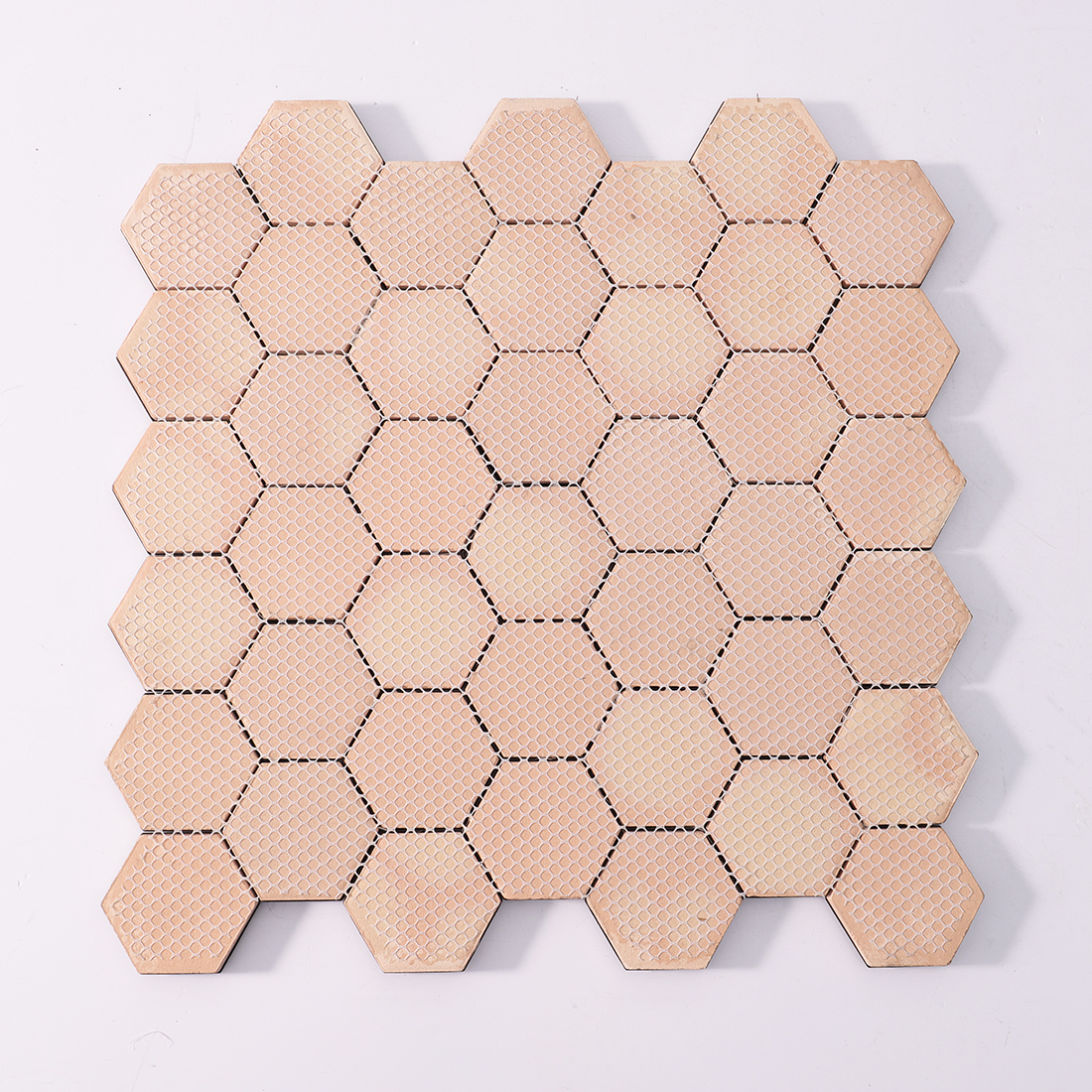 Back view of brushed black geometric metal mosaic tile sheet