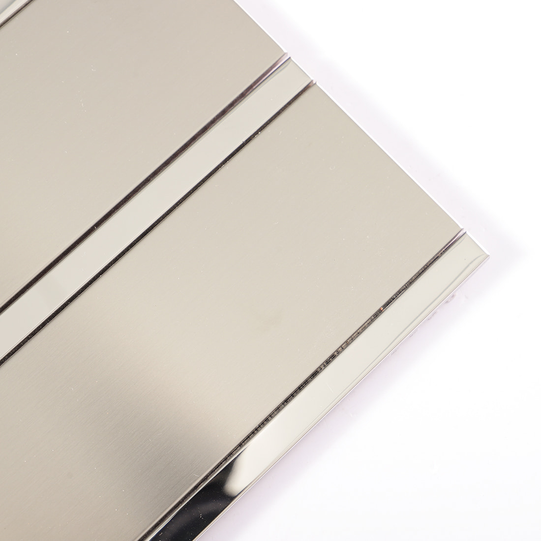 Silver brushed metal strip mosaic tile with polished edge trim