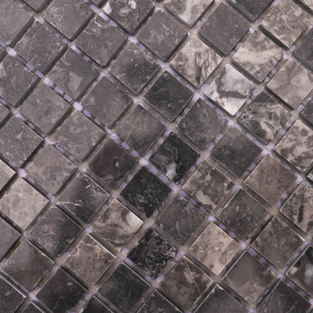 Close-up of dark gray square marble mosaic tiles with natural stone variation