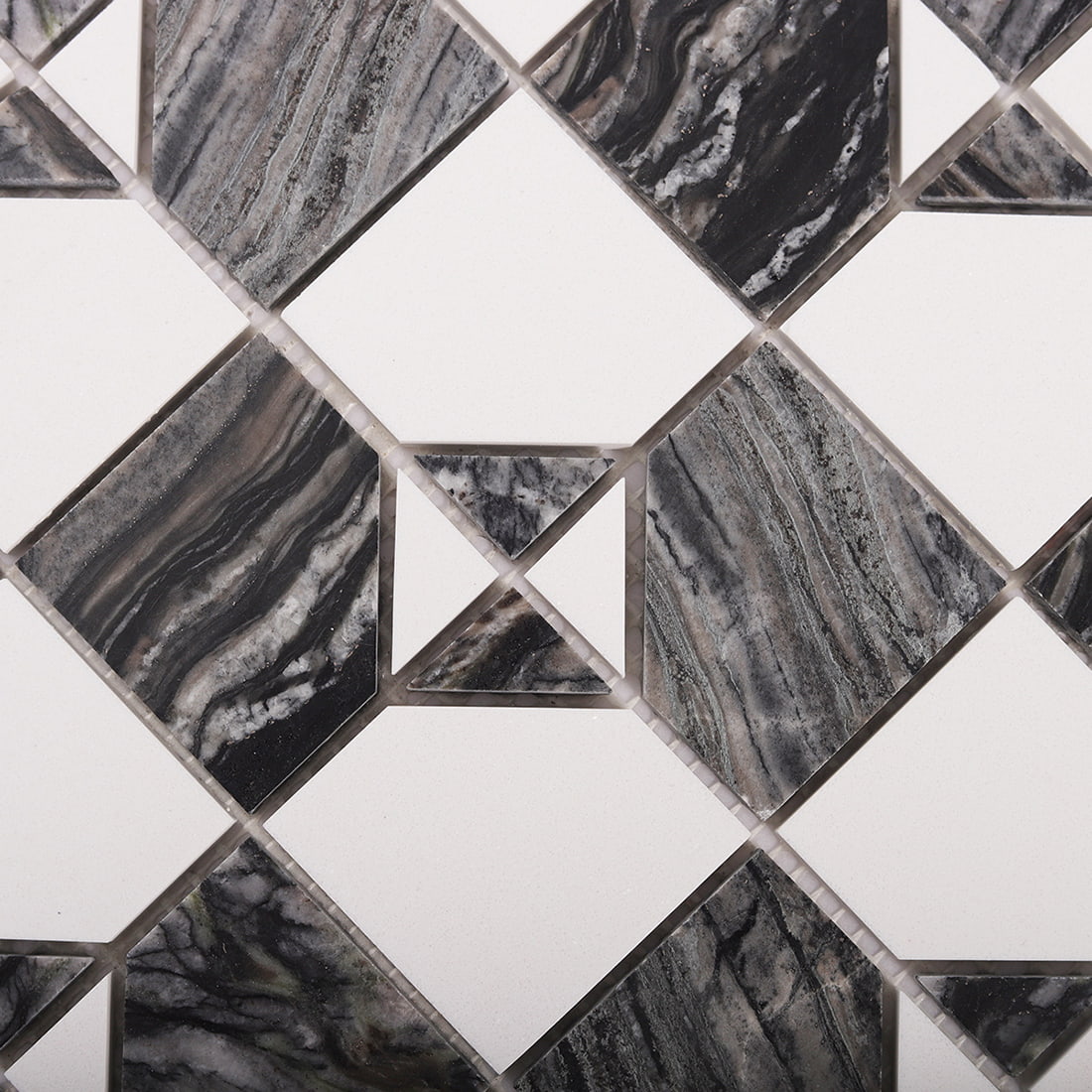 Close up of dark gray marble and white square mosaic pattern with triangle accents