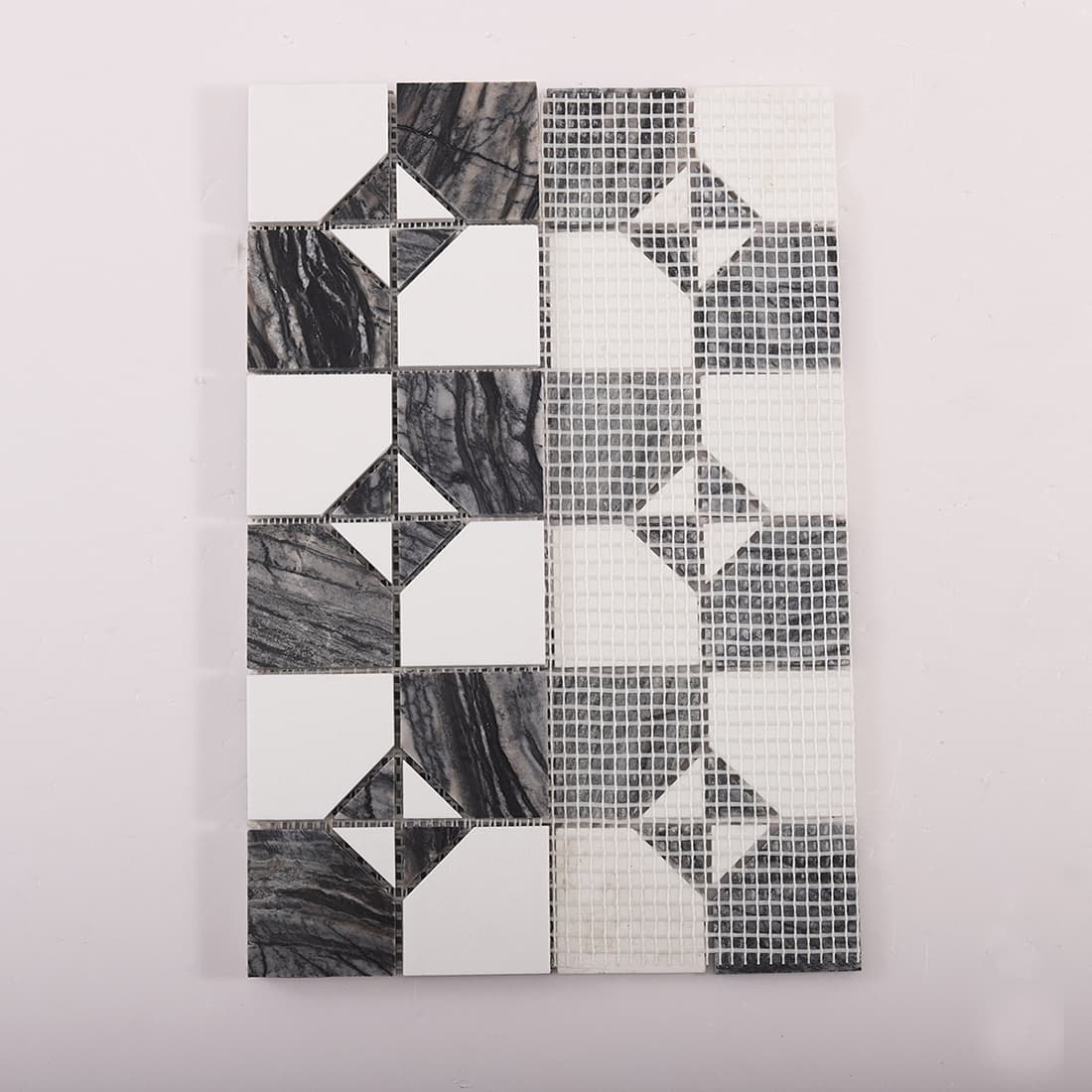 Mesh backing view of dark gray marble and white square mosaic tile sheet with pattern preview