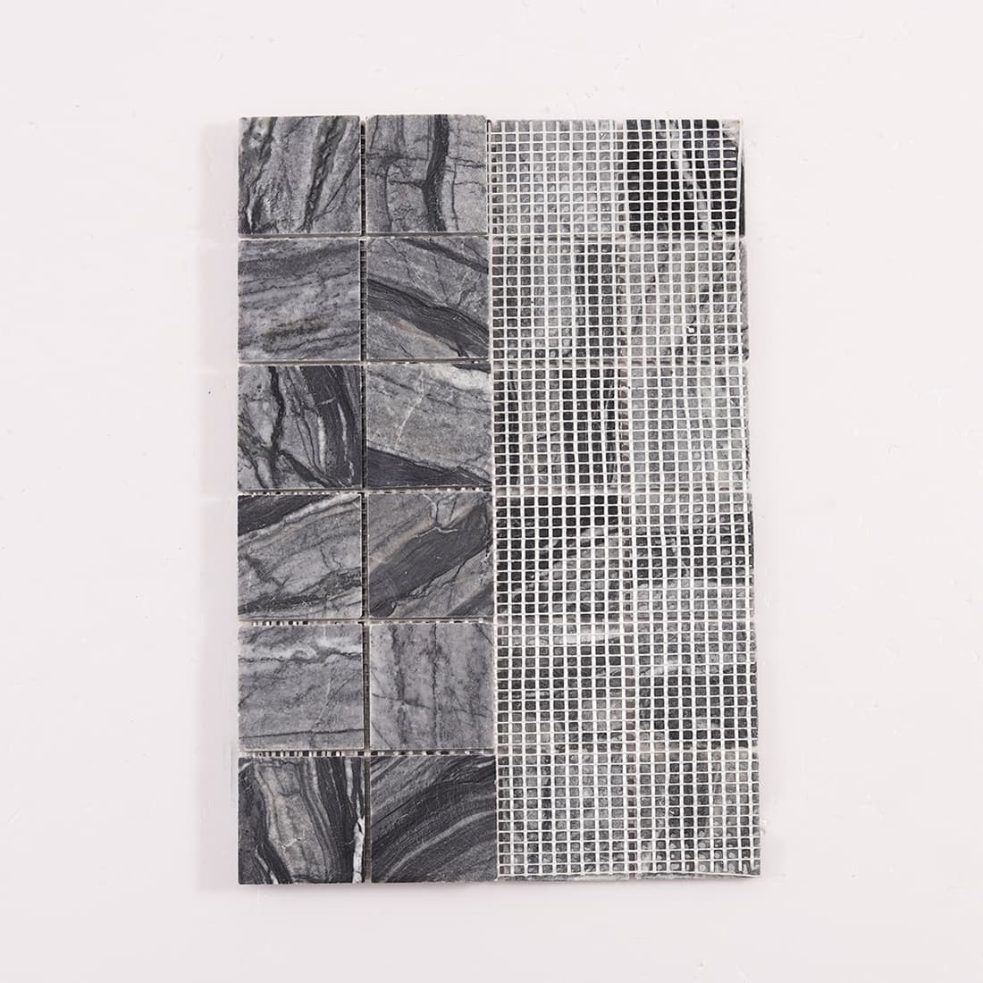 Back view of dark gray marble square mosaic tiles mounted on fiberglass mesh
