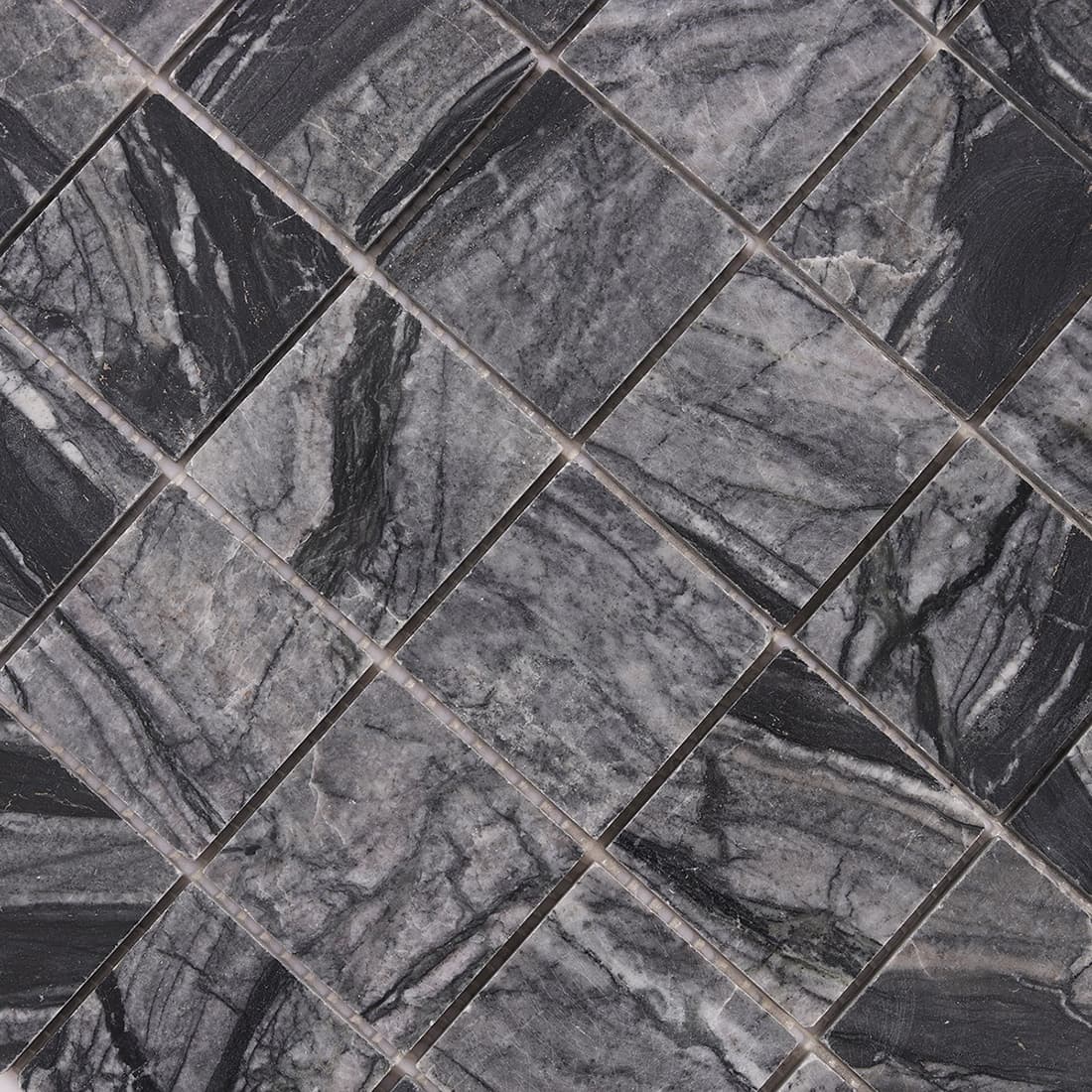 Close up view of dark gray square marble mosaic tile surface texture