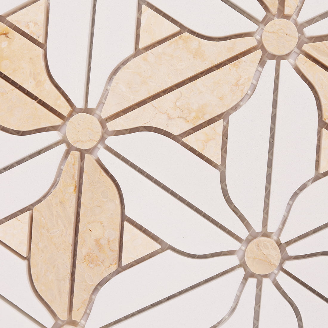 Close up of flower pattern mosaic with white and beige marble pieces