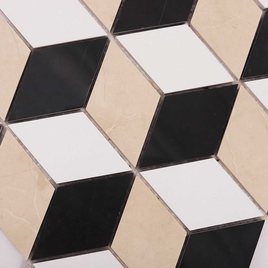 Detailed view of geometric cube mosaic tile pattern with grout lines