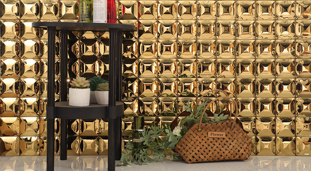 {"default":"Gold 3D square metal mosaic tile wall with reflective raised pattern"}
