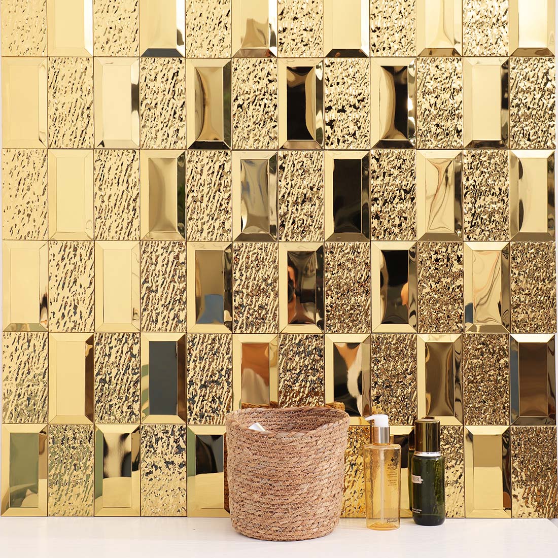 Gold hammered rectangle metal mosaic tile wall in a luxury bathroom