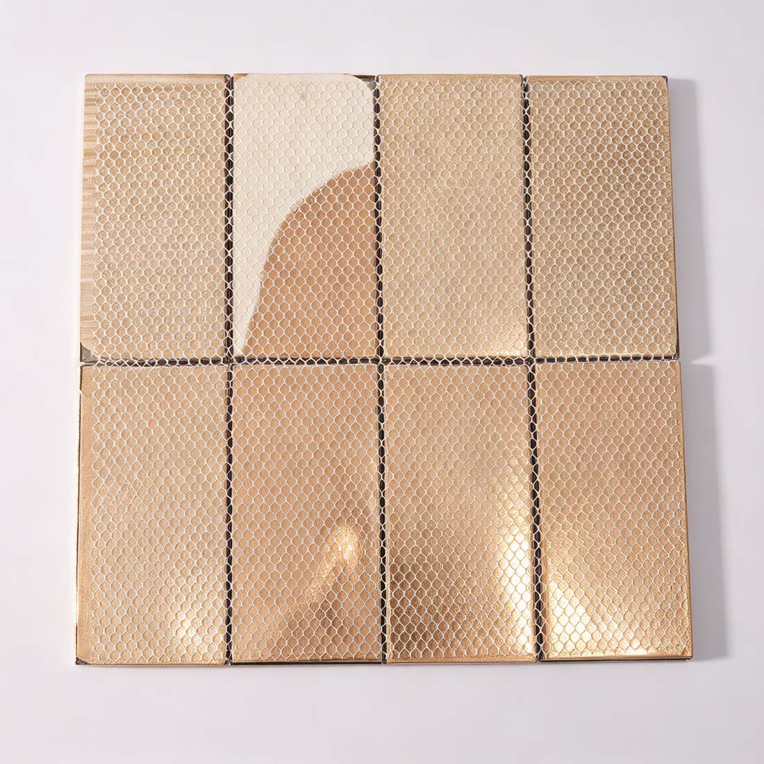 Back view of gold hammered rectangle metal mosaic tile sheet
