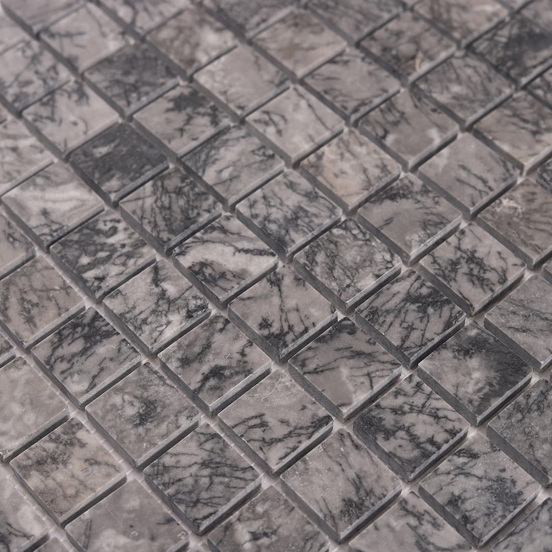 Close up view of gray marble square mosaic tile surface texture