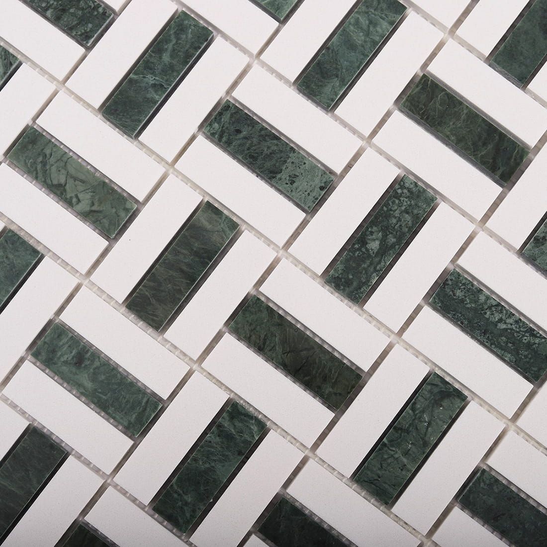 Close-up of green marble and white basket weave mosaic pattern