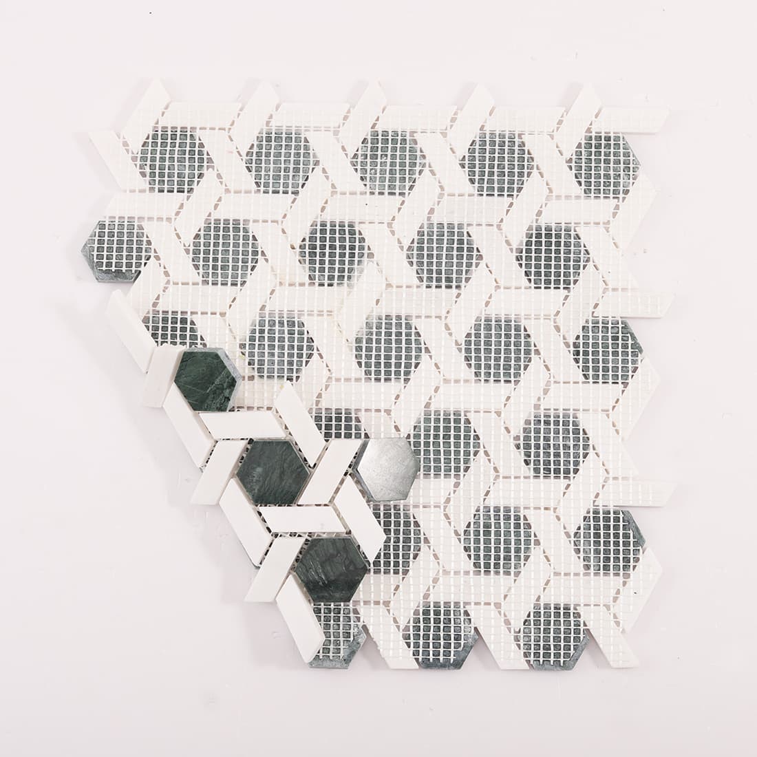 Back view of green hexagon weaved marble mosaic sheet with fiberglass mesh backing