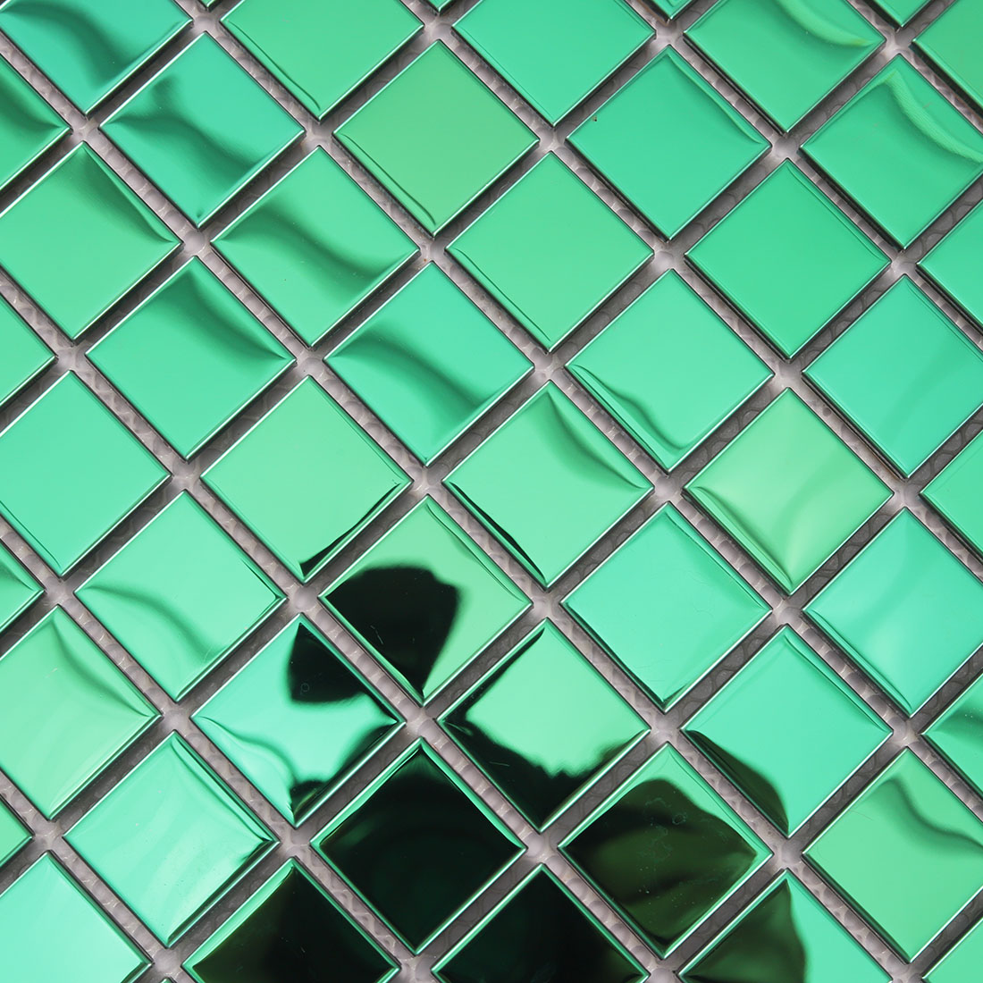 Green square stainless steel mosaic tile detail with reflective metal finish