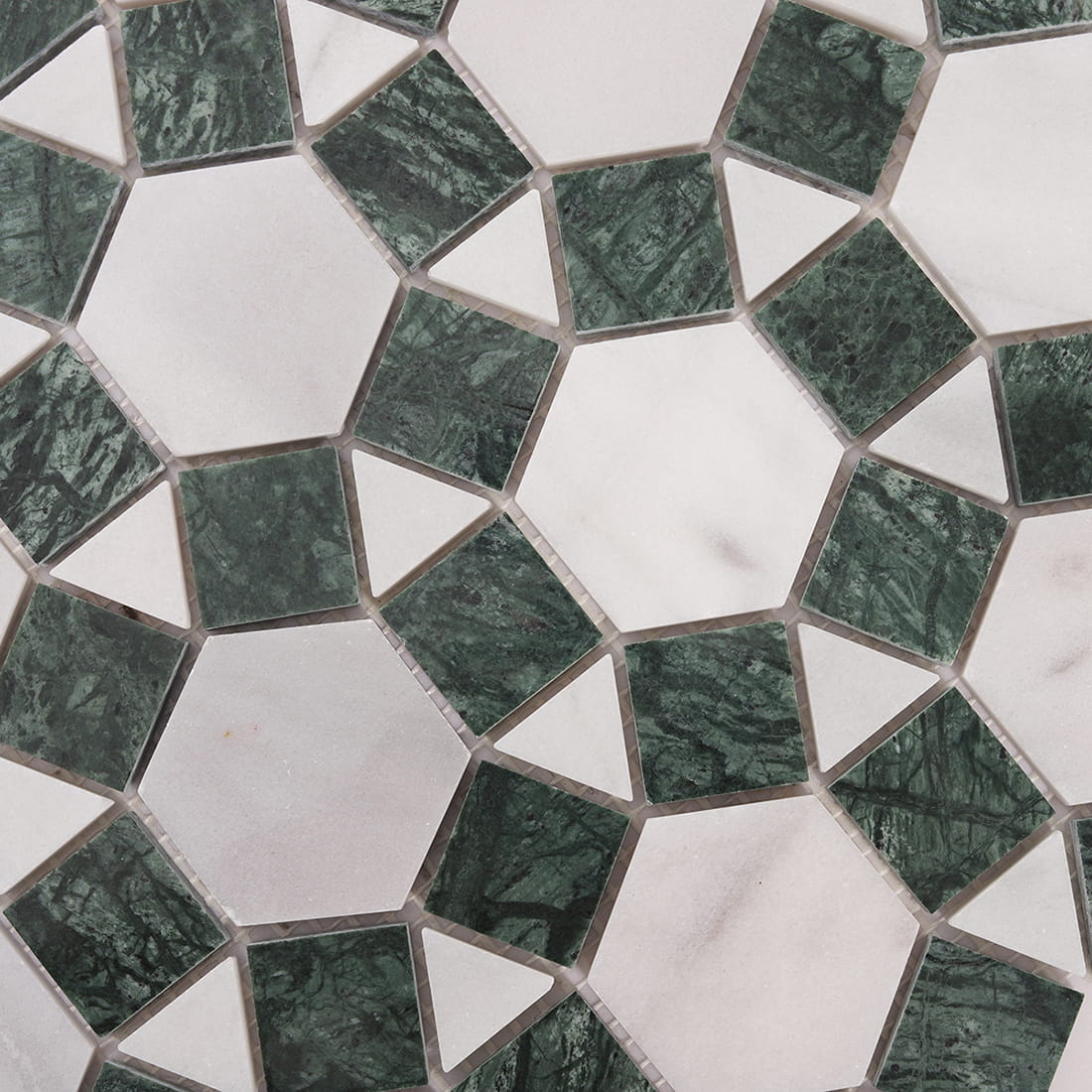 Detailed view of green and white geometric mosaic pattern