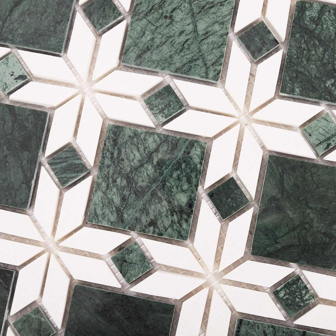 Surface texture of green and white marble flower mosaic tile