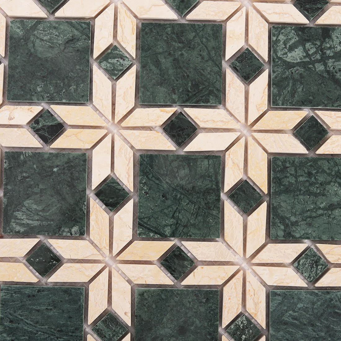 Corner view of green and beige marble flower mosaic tile with clear pattern detail