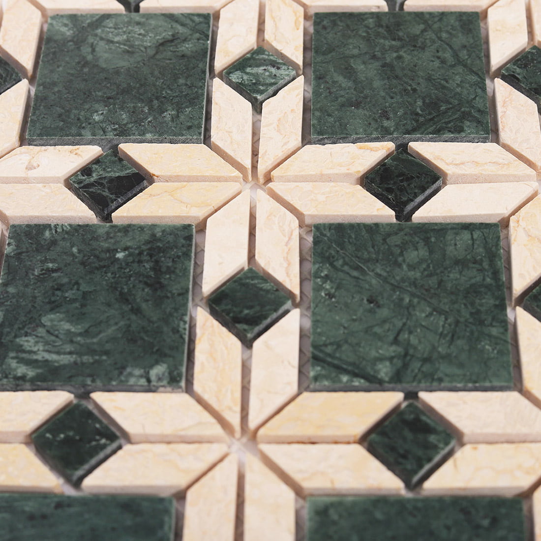 Close up texture of the pattern in green and beige marble flower mosaic tile
