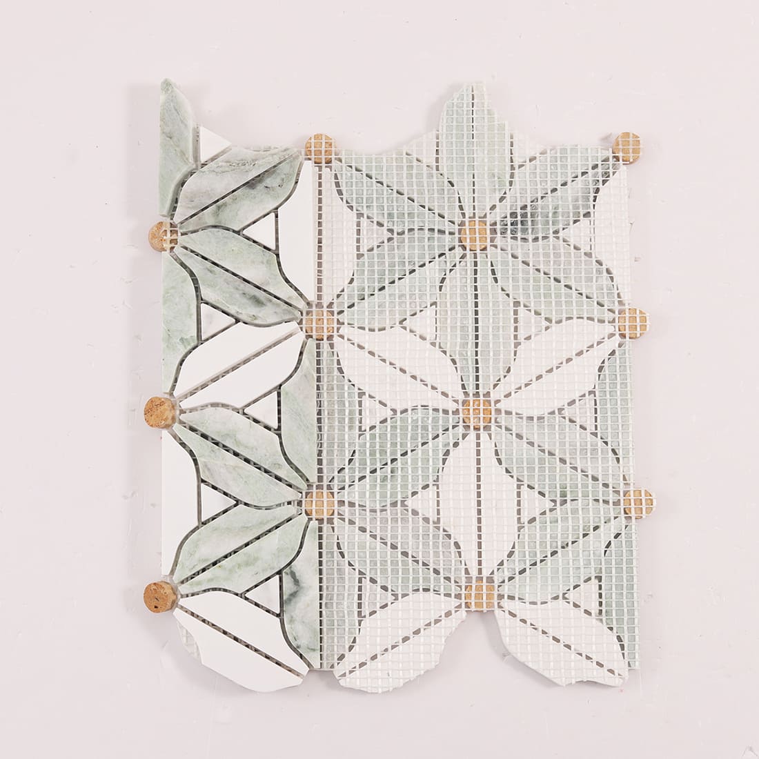 Back view of the mosaic sheet showing mesh backing and windmill flower layout