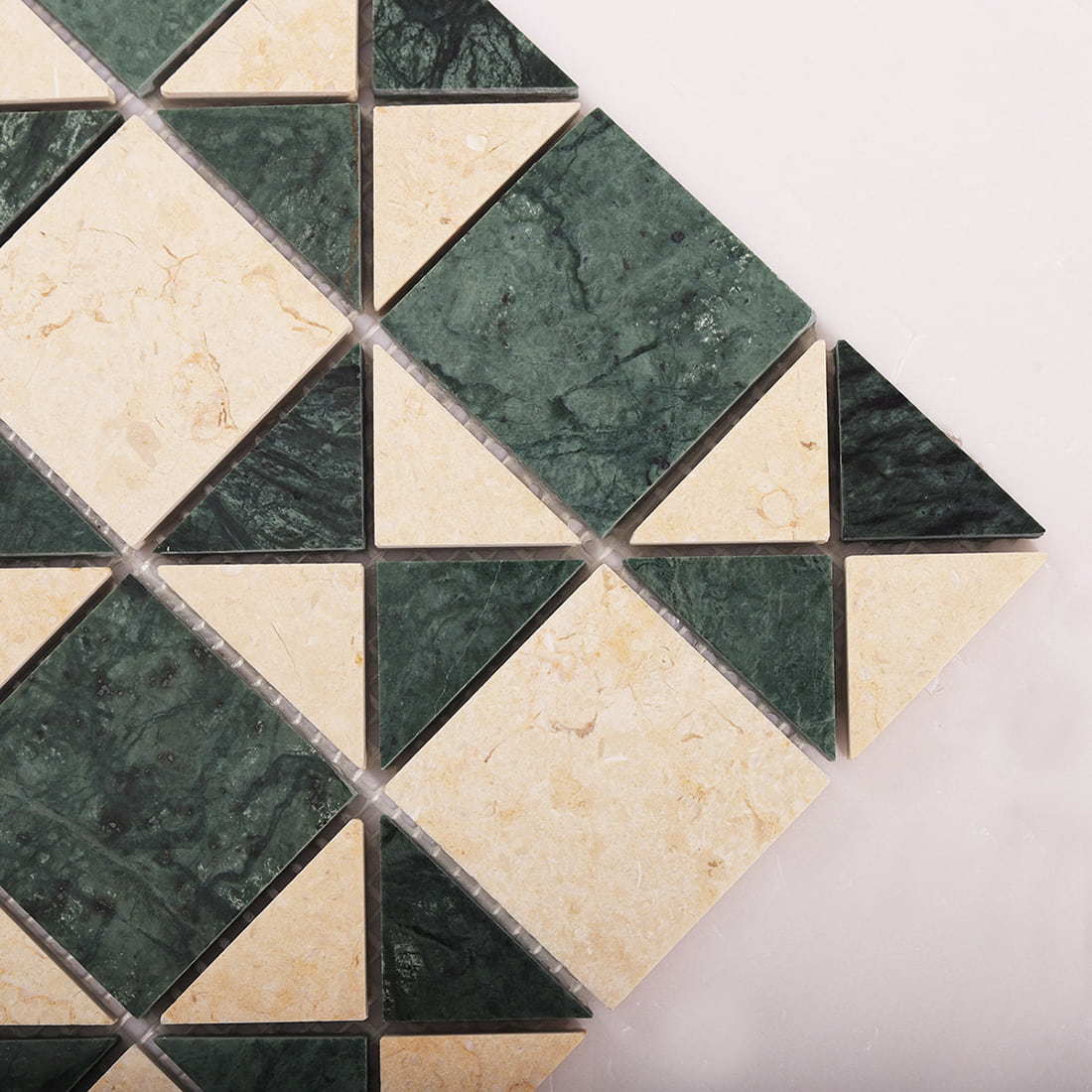 Green and beige marble geometric mosaic tile corner detail
