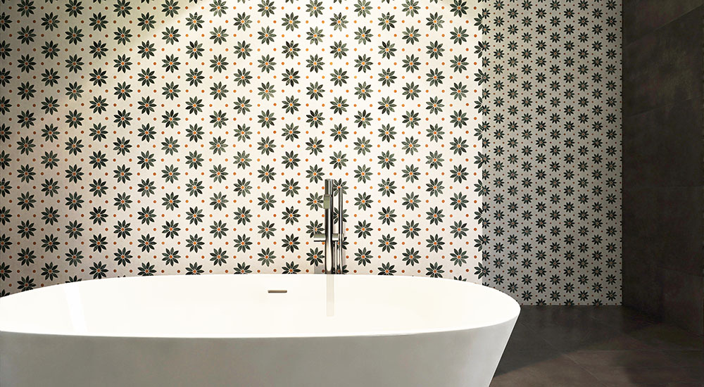 {"default":"Green daisy mosaic wall tiles with white petals in a modern bathroom shower scene"}
