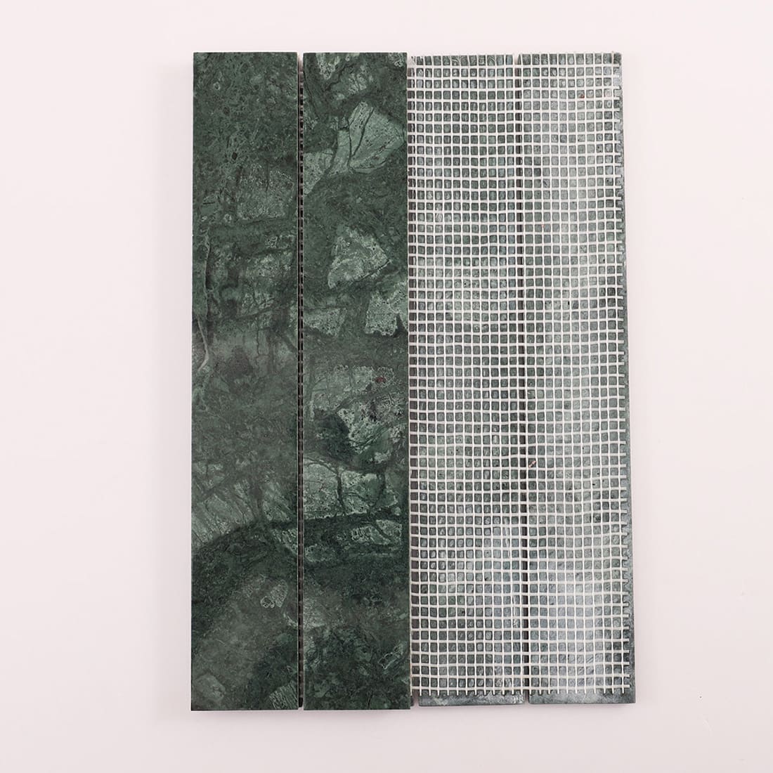 Back view of green marble linear mosaic sheet showing mesh backing on white background