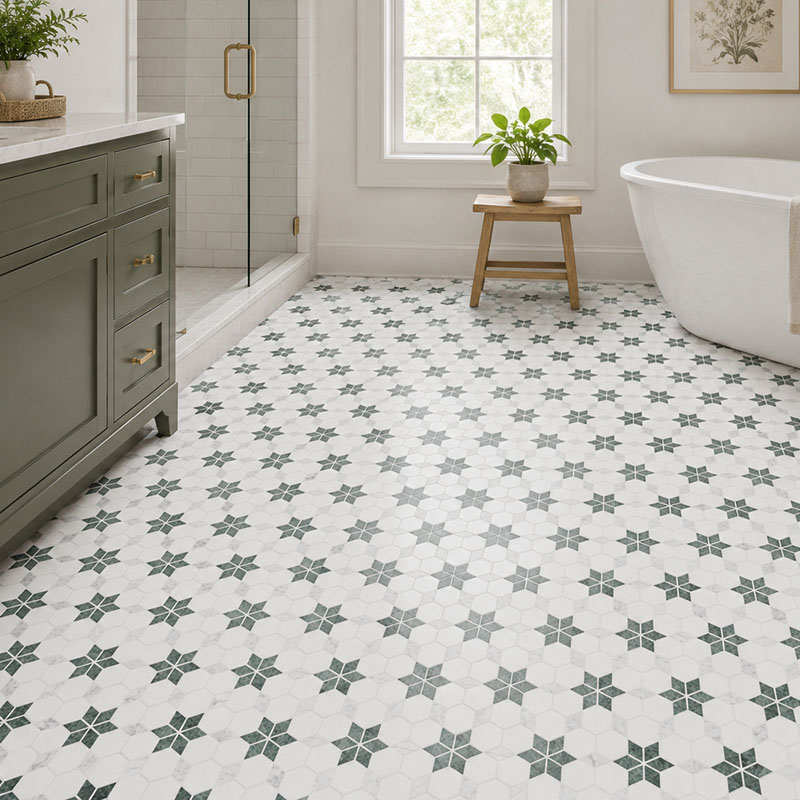 Green and white marble mosaic floor tiles in a bright bathroom
