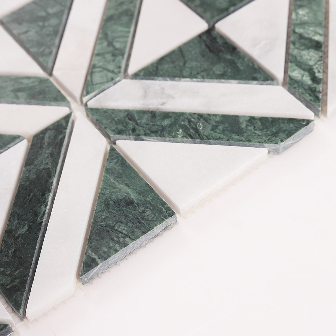 Green and white marble geometric mosaic tile thickness detail