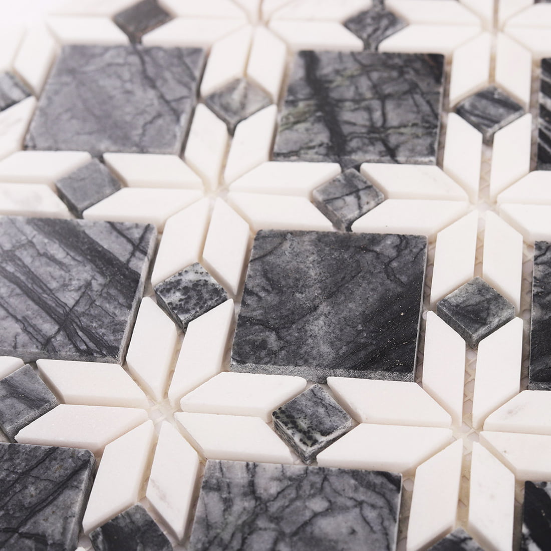 Close up view of grey and white marble mosaic tile surface texture