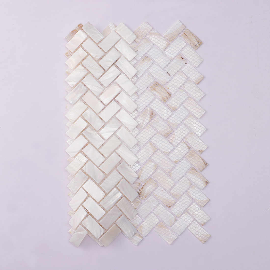 Mosaic sheet shown with front herringbone tiles and mesh backing side by side