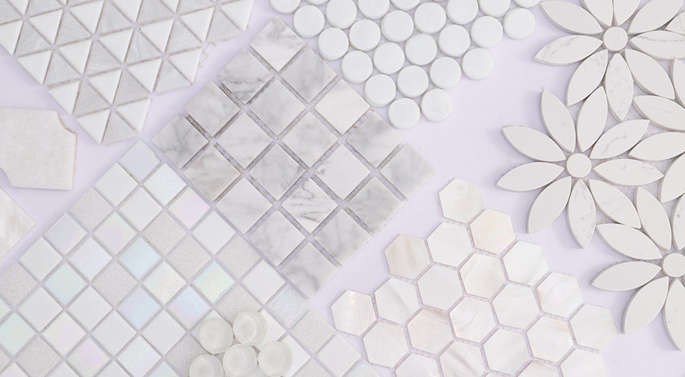 {"default":"Various white marble and ceramic mosaic tiles in geometric and floral patterns"}
