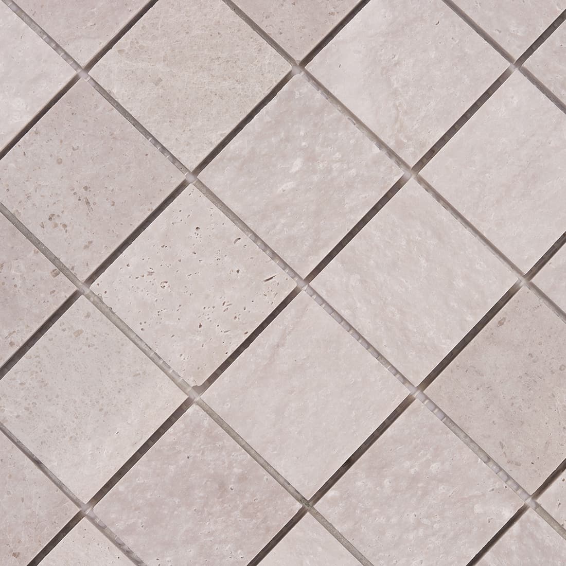 Close up view of light gray square marble mosaic tile surface texture