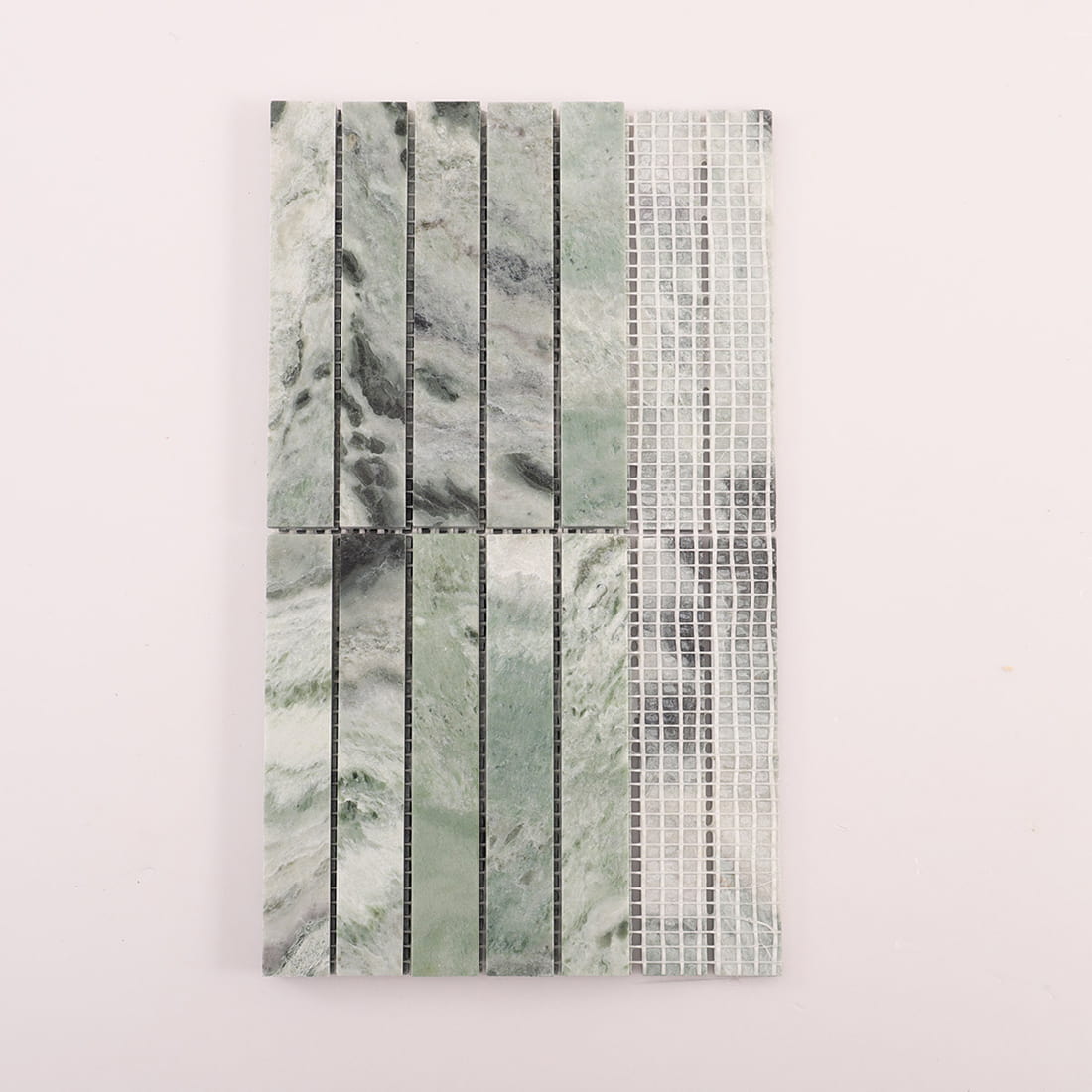 Back view of light green marble long strip mosaic sheet showing mesh backing