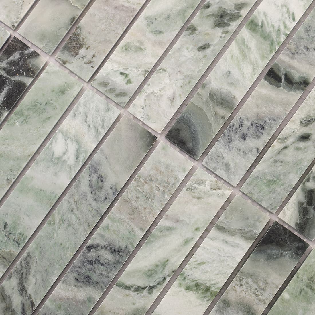 Closeup of mosaic joints showing long strip layout and natural marble veining