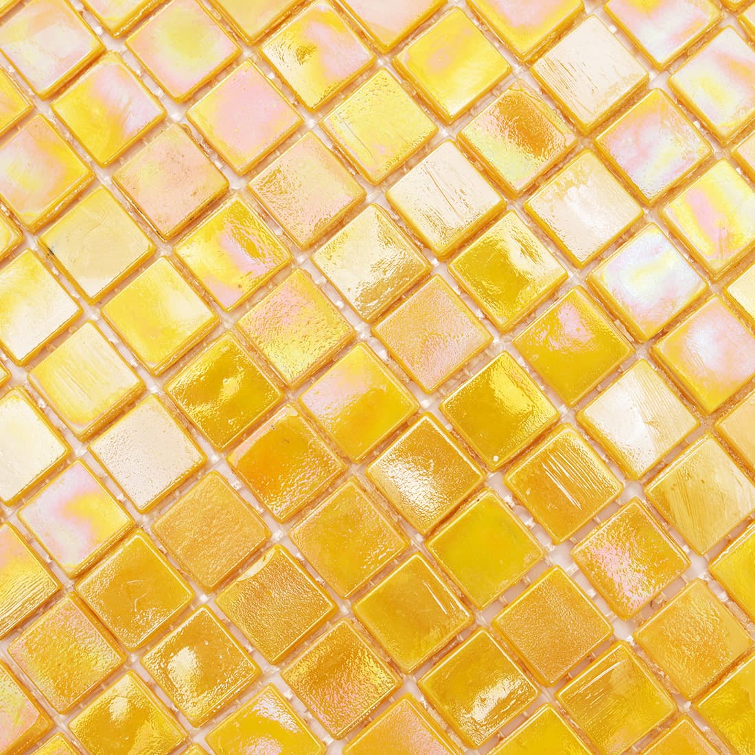  Macro shot of iridescent yellow glass mosaic tiles showing rainbow sheen and texture