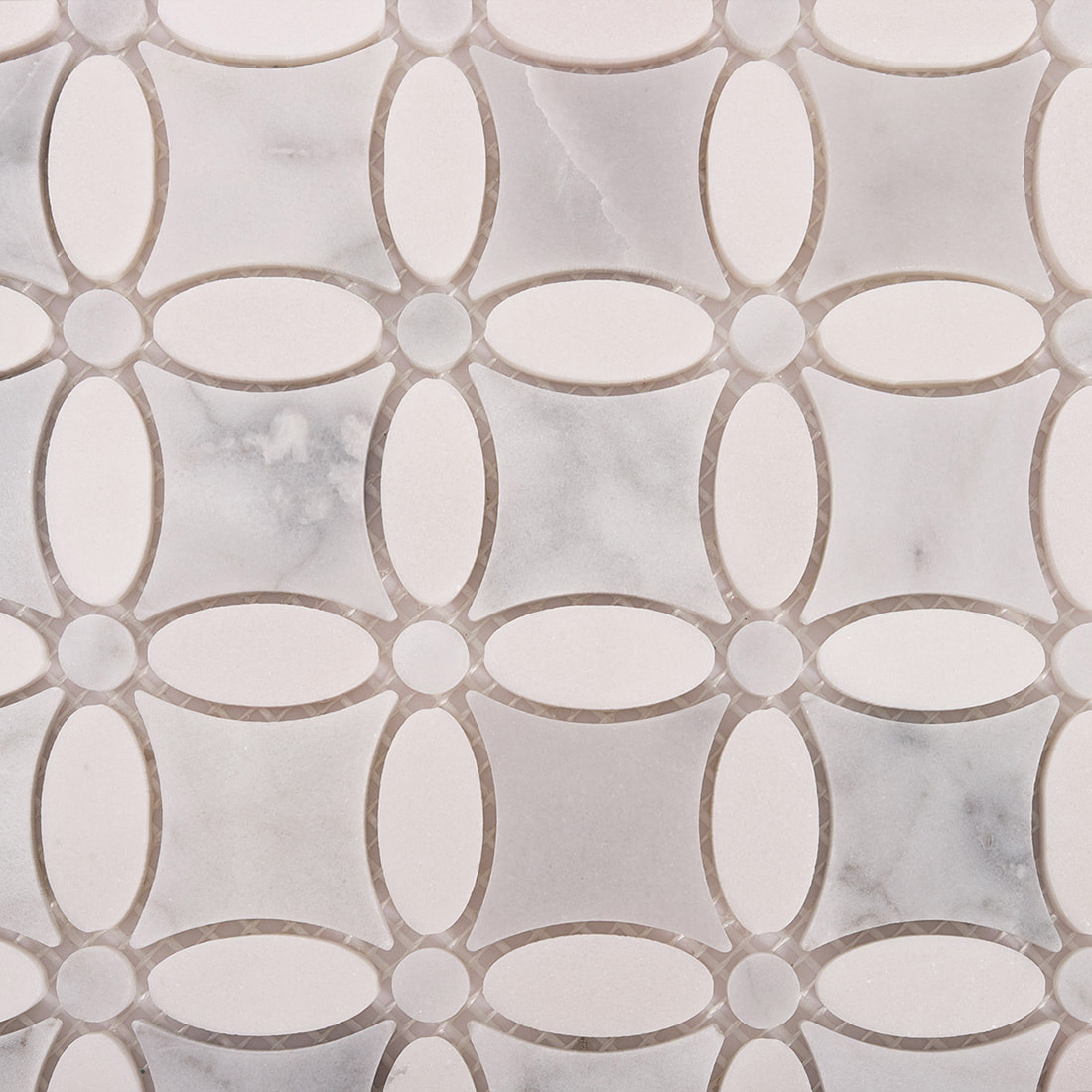 Close up of repeating oval flower mosaic pattern in marble