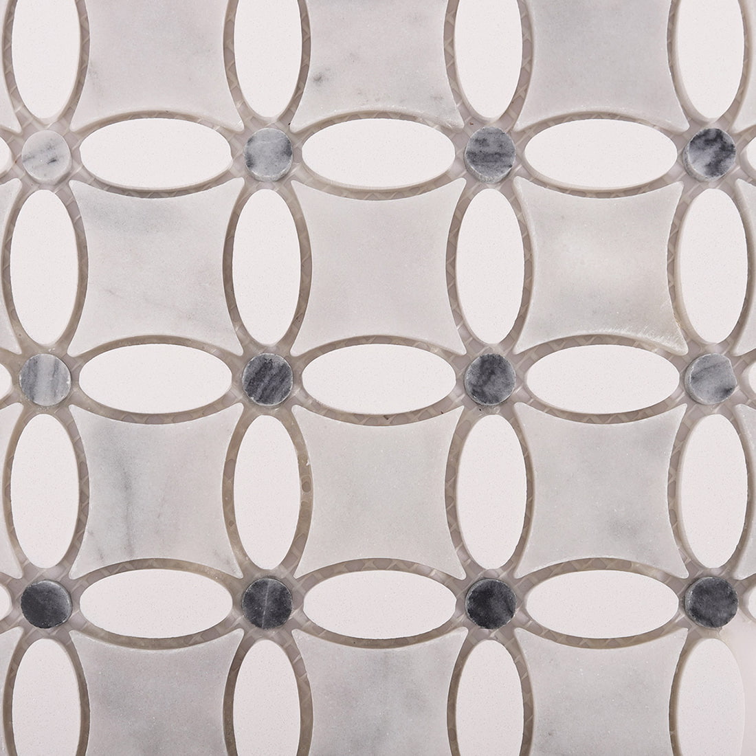 Close up of marble and white oval lattice mosaic pattern with gray dots