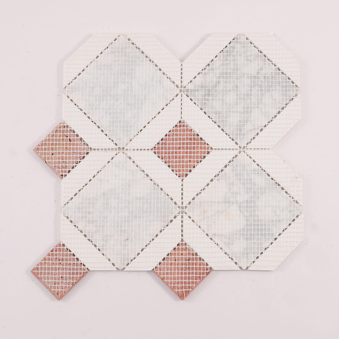 Back view of marble mosaic tile sheet with mesh backing