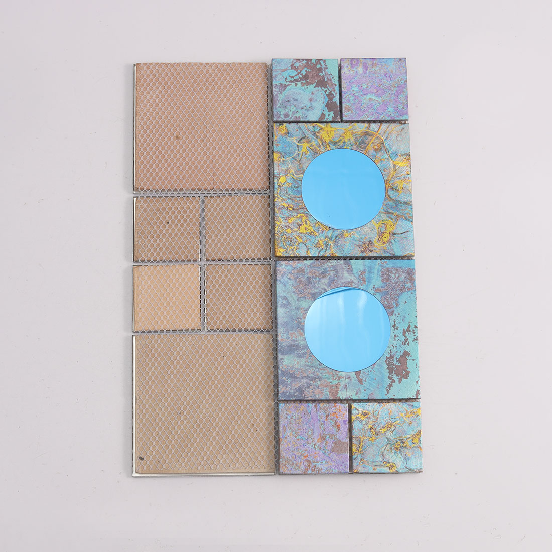 Mesh back view of blue aluminum mosaic tile with round mirror glass inserts