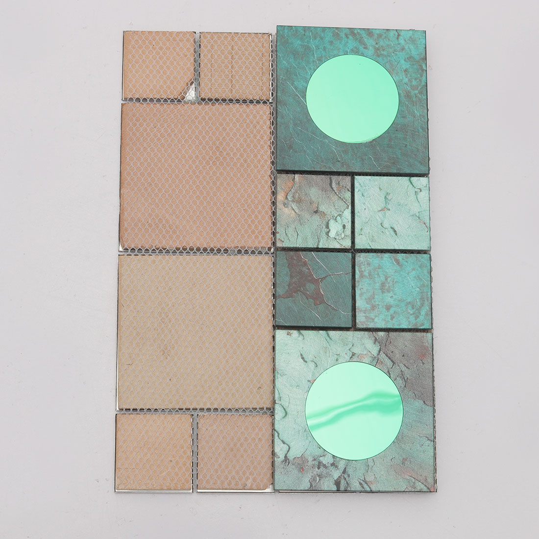 Mesh back view of green aluminum mosaic tile with round mirror glass inserts